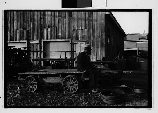 [Five 35mm Film Frames: Man in Front of Movie Poster, Man Seated on Flatbed Wagon in Yard, Vicksburg or New Orleans], Walker Evans (American, St. Louis, Missouri 1903–1975 New Haven, Connecticut), Film negative