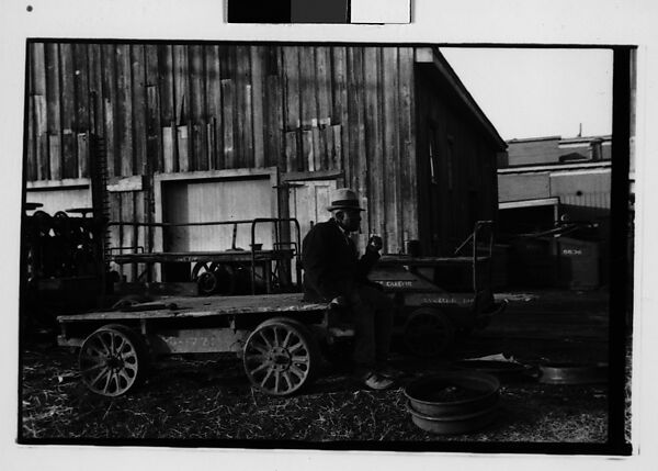 [Five 35mm Film Frames: Man in Front of Movie Poster, Man Seated on Flatbed Wagon in Yard, Vicksburg or New Orleans], Walker Evans (American, St. Louis, Missouri 1903–1975 New Haven, Connecticut), Film negative