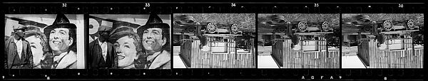 [Five 35mm Film Frames: Man in Front of Movie Poster, Man Seated on Flatbed Wagon in Yard, Vicksburg or New Orleans], Walker Evans (American, St. Louis, Missouri 1903–1975 New Haven, Connecticut), Film negative