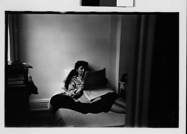 [Five 35mm Film Frames: Jane Smith Evans Reading Newspaper in Bed, New York City]
