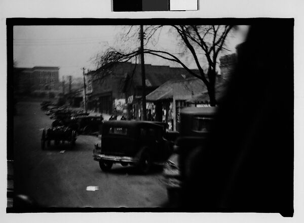 [Parked Cars and Horse-Drawn Wagon on Main Street, Milledgeville, Georgia]