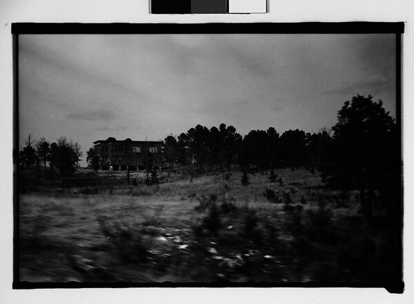 [Flat-Roofed Wooden Building, From Moving Automobile, Macon, Georgia], Walker Evans (American, St. Louis, Missouri 1903–1975 New Haven, Connecticut), Film negative 