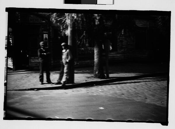 [Two Men on Street Corner, From Moving Automobile, Savannah, Georgia]