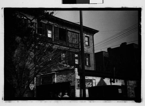 [Italianate Town House Behind Brick Building with Coca-Cola Signs, From Automobile, Savannah, Georgia], Walker Evans (American, St. Louis, Missouri 1903–1975 New Haven, Connecticut), Film negative 