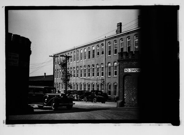 [Warehouse Building with Car Rounding Corner, From Automobile, Savannah, Georgia], Walker Evans (American, St. Louis, Missouri 1903–1975 New Haven, Connecticut), Film negative 