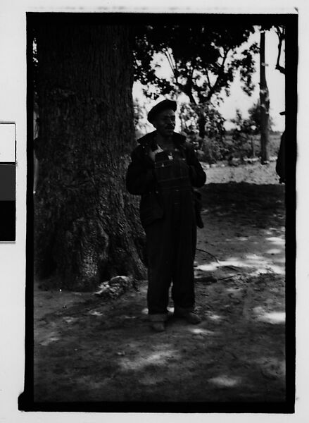 [Man Wearing Cap and Overalls Standing Next to Tree, Hale County?, Alabama], Walker Evans (American, St. Louis, Missouri 1903–1975 New Haven, Connecticut), Film negative 