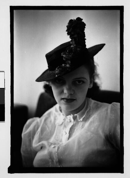 [Thirty-One 35mm Film Frames on Uncut Roll: Portraits of Anne Harvey Wearing Floral Hat], Walker Evans (American, St. Louis, Missouri 1903–1975 New Haven, Connecticut), Film negative