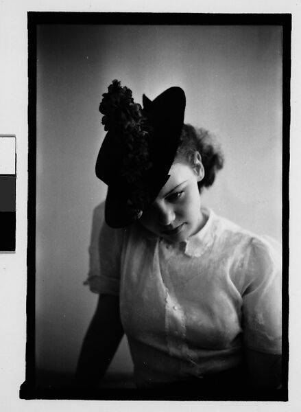 [Thirty-One 35mm Film Frames on Uncut Roll: Portraits of Anne Harvey Wearing Floral Hat], Walker Evans (American, St. Louis, Missouri 1903–1975 New Haven, Connecticut), Film negative