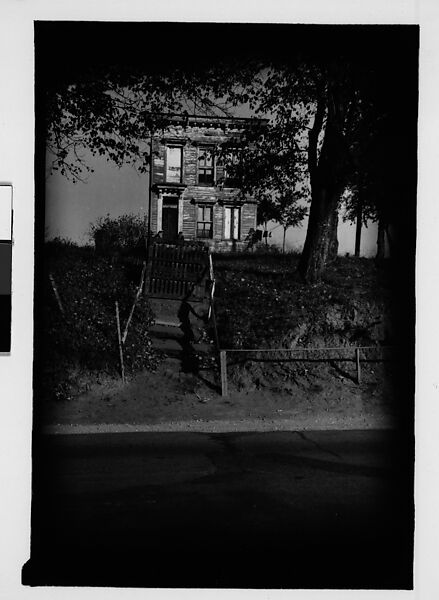 [Thirty 35mm Film Frames on Uncut Roll: of Headstones, A War Medallion, and An Abandoned House Next to A Lumberyard, New Castle, Delaware and Washington, D.C.], Walker Evans (American, St. Louis, Missouri 1903–1975 New Haven, Connecticut), Film negative