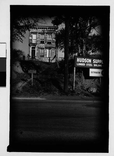 [Thirty 35mm Film Frames on Uncut Roll: of Headstones, A War Medallion, and An Abandoned House Next to A Lumberyard, New Castle, Delaware and Washington, D.C.], Walker Evans (American, St. Louis, Missouri 1903–1975 New Haven, Connecticut), Film negative