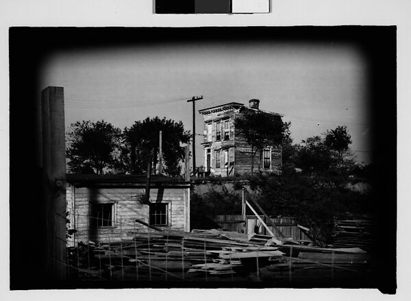 [Thirty 35mm Film Frames on Uncut Roll: of Headstones, A War Medallion, and An Abandoned House Next to A Lumberyard, New Castle, Delaware and Washington, D.C.], Walker Evans (American, St. Louis, Missouri 1903–1975 New Haven, Connecticut), Film negative