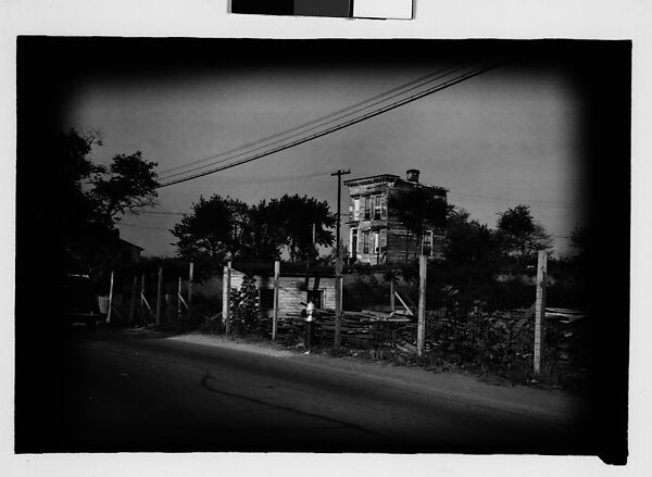 [Thirty 35mm Film Frames on Uncut Roll: of Headstones, A War Medallion, and An Abandoned House Next to A Lumberyard, New Castle, Delaware and Washington, D.C.], Walker Evans (American, St. Louis, Missouri 1903–1975 New Haven, Connecticut), Film negative
