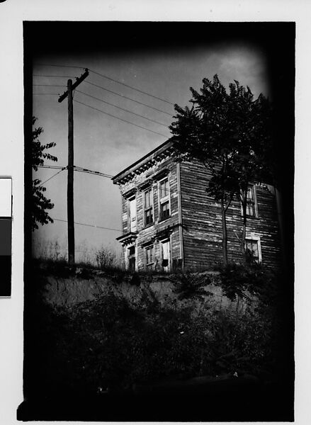 [Thirty 35mm Film Frames on Uncut Roll: of Headstones, A War Medallion, and An Abandoned House Next to A Lumberyard, New Castle, Delaware and Washington, D.C.], Walker Evans (American, St. Louis, Missouri 1903–1975 New Haven, Connecticut), Film negative