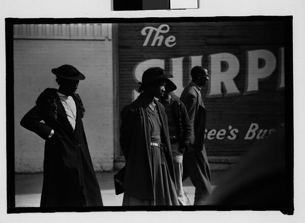 [Thirty-One 35mm Film Frames on Uncut Roll of People on Street, Including 3 of A Tintype Photographer at Work, Tallahassee, Florida], Walker Evans (American, St. Louis, Missouri 1903–1975 New Haven, Connecticut), Film negative