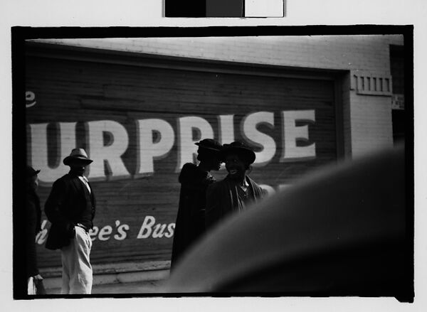 [Thirty-One 35mm Film Frames on Uncut Roll of People on Street, Including 3 of A Tintype Photographer at Work, Tallahassee, Florida], Walker Evans (American, St. Louis, Missouri 1903–1975 New Haven, Connecticut), Film negative