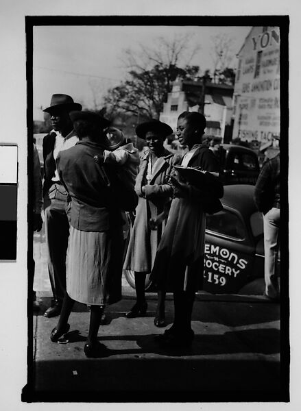 [Thirty-One 35mm Film Frames on Uncut Roll of People on Street, Including 3 of A Tintype Photographer at Work, Tallahassee, Florida], Walker Evans (American, St. Louis, Missouri 1903–1975 New Haven, Connecticut), Film negative