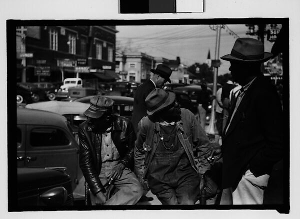 [Thirty-One 35mm Film Frames on Uncut Roll of People on Street, Including 3 of A Tintype Photographer at Work, Tallahassee, Florida], Walker Evans (American, St. Louis, Missouri 1903–1975 New Haven, Connecticut), Film negative