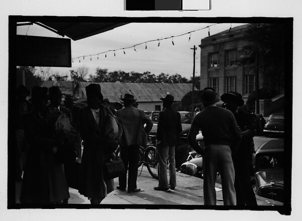 [Thirty-One 35mm Film Frames on Uncut Roll of People on Street, Including 3 of A Tintype Photographer at Work, Tallahassee, Florida], Walker Evans (American, St. Louis, Missouri 1903–1975 New Haven, Connecticut), Film negative