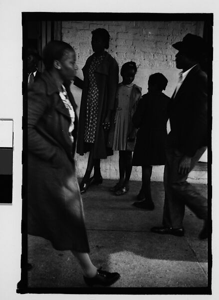 [Thirty-One 35mm Film Frames on Uncut Roll of People on Street, Including 3 of A Tintype Photographer at Work, Tallahassee, Florida], Walker Evans (American, St. Louis, Missouri 1903–1975 New Haven, Connecticut), Film negative