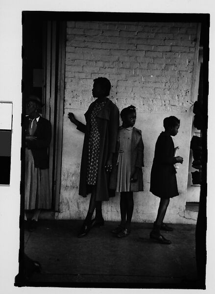 [Thirty-One 35mm Film Frames on Uncut Roll of People on Street, Including 3 of A Tintype Photographer at Work, Tallahassee, Florida], Walker Evans (American, St. Louis, Missouri 1903–1975 New Haven, Connecticut), Film negative