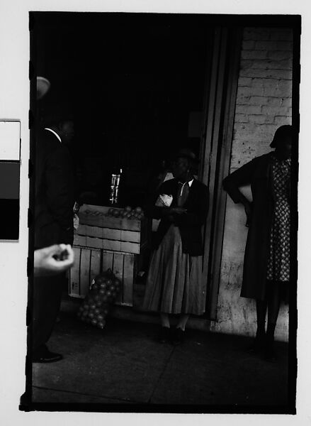 [Thirty-One 35mm Film Frames on Uncut Roll of People on Street, Including 3 of A Tintype Photographer at Work, Tallahassee, Florida], Walker Evans (American, St. Louis, Missouri 1903–1975 New Haven, Connecticut), Film negative