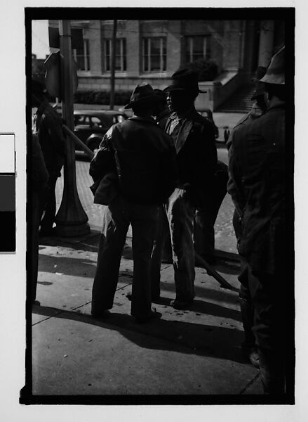[Thirty-One 35mm Film Frames on Uncut Roll of People on Street, Including 3 of A Tintype Photographer at Work, Tallahassee, Florida], Walker Evans (American, St. Louis, Missouri 1903–1975 New Haven, Connecticut), Film negative