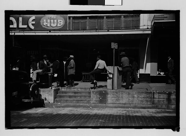 [Thirty-One 35mm Film Frames on Uncut Roll of People on Street, Including 3 of A Tintype Photographer at Work, Tallahassee, Florida], Walker Evans (American, St. Louis, Missouri 1903–1975 New Haven, Connecticut), Film negative