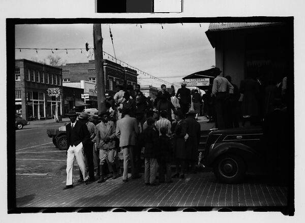 [Thirty-One 35mm Film Frames on Uncut Roll of People on Street, Including 3 of A Tintype Photographer at Work, Tallahassee, Florida], Walker Evans (American, St. Louis, Missouri 1903–1975 New Haven, Connecticut), Film negative