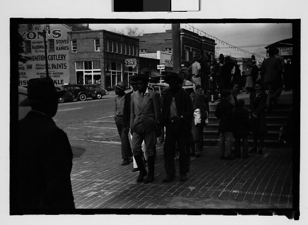 [Thirty-One 35mm Film Frames on Uncut Roll of People on Street, Including 3 of A Tintype Photographer at Work, Tallahassee, Florida], Walker Evans (American, St. Louis, Missouri 1903–1975 New Haven, Connecticut), Film negative