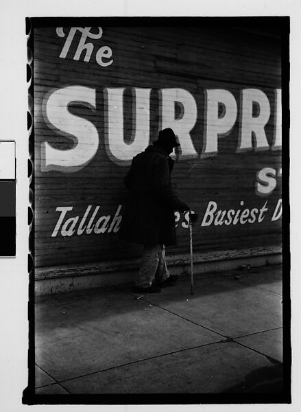 [Thirty-One 35mm Film Frames on Uncut Roll of People on Street, Including 3 of A Tintype Photographer at Work, Tallahassee, Florida], Walker Evans (American, St. Louis, Missouri 1903–1975 New Haven, Connecticut), Film negative