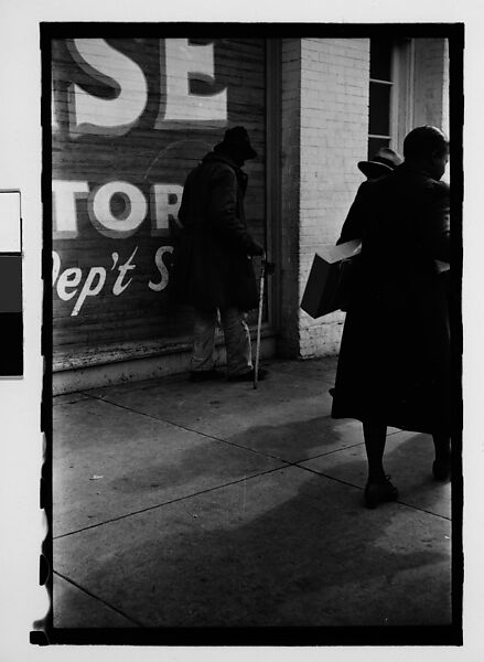 [Thirty-One 35mm Film Frames on Uncut Roll of People on Street, Including 3 of A Tintype Photographer at Work, Tallahassee, Florida], Walker Evans (American, St. Louis, Missouri 1903–1975 New Haven, Connecticut), Film negative
