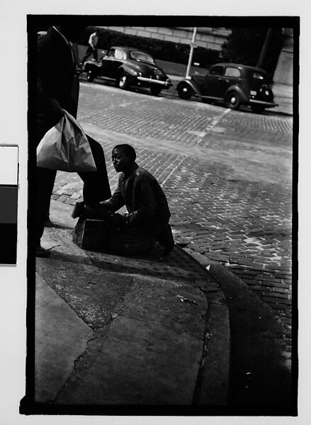 [Five 35mm Film Frames on Uncut Roll of Boy Shining Shoes on Street Corner and Men Outside Shoe Store, Tallahassee, Florida], Walker Evans (American, St. Louis, Missouri 1903–1975 New Haven, Connecticut), Film negative 