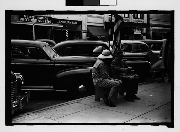 [Three 35mm Film Frames on Uncut Roll: Two Elderly Men Seated on Main Street Sidewalk Bench, Sarasota, Florida], Walker Evans (American, St. Louis, Missouri 1903–1975 New Haven, Connecticut), Film negative 