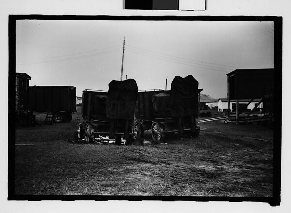 [Seven 35mm Film Frames on Uncut Roll: 5 Views of Wagons and Buildings at Ringling Brothers Circus Winter Quarters, Sarasota, Florida, 1 Study of Illustrated Bank Calendar for November 1941, and 1 Test Frame Inside Automobile], Walker Evans (American, St. Louis, Missouri 1903–1975 New Haven, Connecticut), Film negative