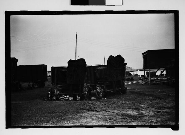 [Seven 35mm Film Frames on Uncut Roll: 5 Views of Wagons and Buildings at Ringling Brothers Circus Winter Quarters, Sarasota, Florida, 1 Study of Illustrated Bank Calendar for November 1941, and 1 Test Frame Inside Automobile], Walker Evans (American, St. Louis, Missouri 1903–1975 New Haven, Connecticut), Film negative