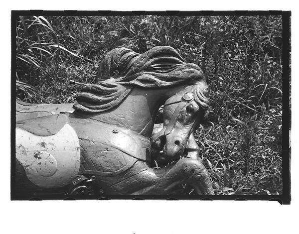 [Twenty-Two 35mm Film Frames on Uncut Roll: 21 Studies of Dismounted Carousel Horses in Field, and 1 View of Parked Automobile in Front of Roadside Building], Walker Evans (American, St. Louis, Missouri 1903–1975 New Haven, Connecticut), Film negative