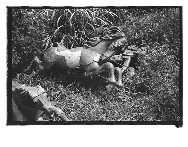 [Twenty-Two 35mm Film Frames on Uncut Roll: 21 Studies of Dismounted Carousel Horses in Field, and 1 View of Parked Automobile in Front of Roadside Building], Walker Evans (American, St. Louis, Missouri 1903–1975 New Haven, Connecticut), Film negative