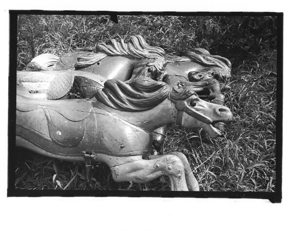 [Twenty-Two 35mm Film Frames on Uncut Roll: 21 Studies of Dismounted Carousel Horses in Field, and 1 View of Parked Automobile in Front of Roadside Building], Walker Evans (American, St. Louis, Missouri 1903–1975 New Haven, Connecticut), Film negative