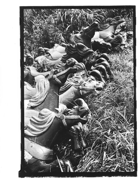 [Twenty-Two 35mm Film Frames on Uncut Roll: 21 Studies of Dismounted Carousel Horses in Field, and 1 View of Parked Automobile in Front of Roadside Building], Walker Evans (American, St. Louis, Missouri 1903–1975 New Haven, Connecticut), Film negative