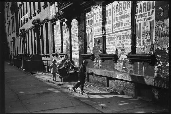 [Two 35mm Film Frames: View Down Street in Hell's Kitchen with Children on Stoop and Torn Circus Posters, New York City], Walker Evans (American, St. Louis, Missouri 1903–1975 New Haven, Connecticut), Film negative 