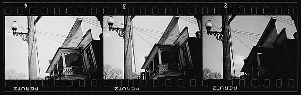 [Three 35mm Film Frames: Jigsaw Trim Roofline of Saake's Drugstore with Streetlight and Power Lines, Probably Millerton, New York], Walker Evans (American, St. Louis, Missouri 1903–1975 New Haven, Connecticut), Film negative