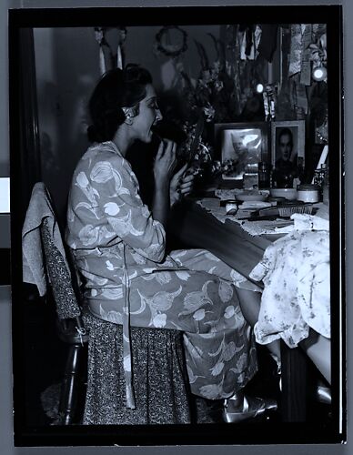 [Alexandra Danilova Applying Makeup in Dressing Room, New York City]