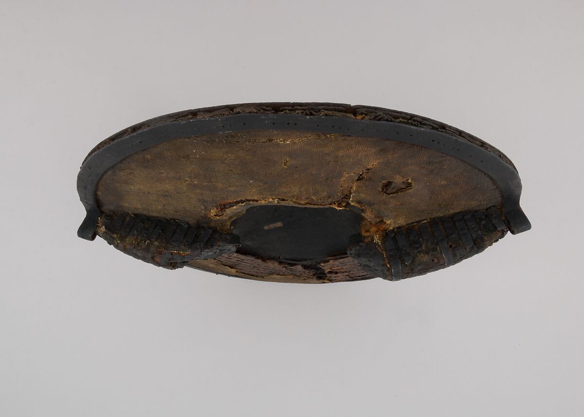 Buckler, Iron, pigskin, brass, wood, fiber (flax), linen, British, Wrexham, Wales