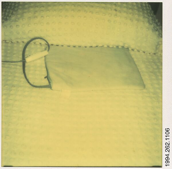 [Heating Pad on Bed], Walker Evans (American, St. Louis, Missouri 1903–1975 New Haven, Connecticut), Instant internal dye diffusion transfer print (Polaroid SX-70) 