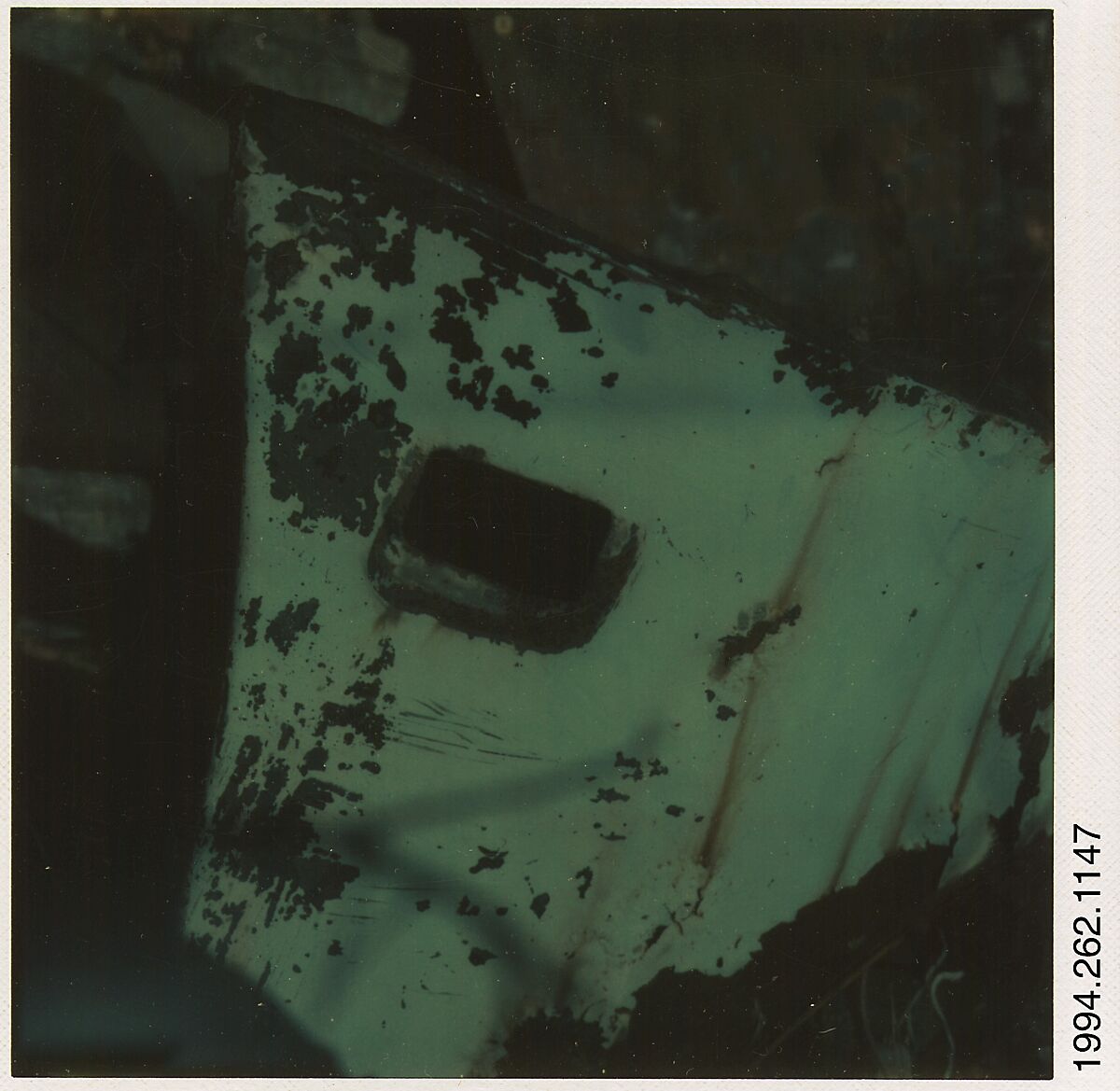 [Auto Junkyard, Old Lyme, Connecticut: Door], Walker Evans (American, St. Louis, Missouri 1903–1975 New Haven, Connecticut), Instant internal dye diffusion transfer print (Polaroid SX-70) 