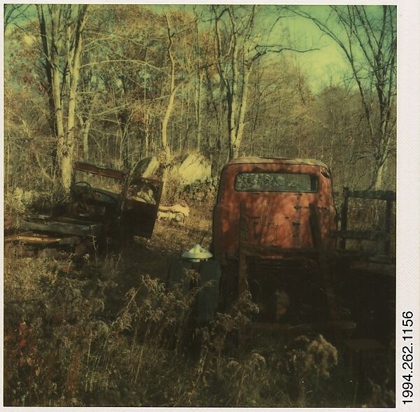 [Auto Junkyard, Old Lyme, Connecticut: Two Trucks, Weeds], Walker Evans (American, St. Louis, Missouri 1903–1975 New Haven, Connecticut), Instant internal dye diffusion transfer print (Polaroid SX-70) 