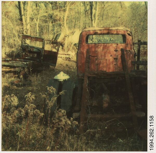 [Auto Junkyard, Old Lyme, Connecticut: Two Trucks, Weeds], Walker Evans (American, St. Louis, Missouri 1903–1975 New Haven, Connecticut), Instant internal dye diffusion transfer print (Polaroid SX-70) 