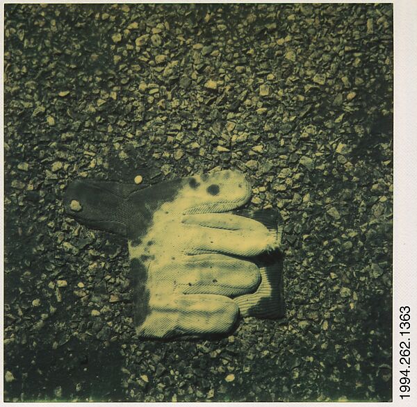 [White Workglove Embedded in Pavement], Walker Evans (American, St. Louis, Missouri 1903–1975 New Haven, Connecticut), Instant internal dye diffusion transfer print (Polaroid SX-70) 