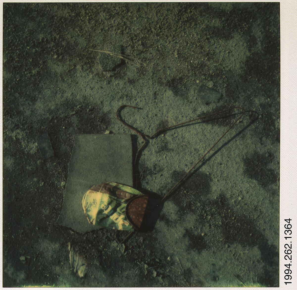[Trash: Crushed Sprite Can and Wire Hanger], Walker Evans (American, St. Louis, Missouri 1903–1975 New Haven, Connecticut), Instant internal dye diffusion transfer print (Polaroid SX-70) 