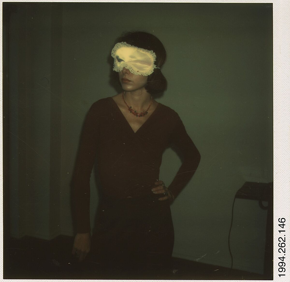 [Joyce Baronio Wearing Sleep Mask], Walker Evans (American, St. Louis, Missouri 1903–1975 New Haven, Connecticut), Instant internal dye diffusion transfer print (Polaroid SX-70) 